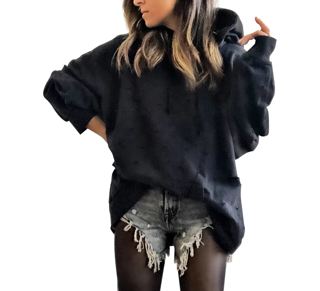 The perfect oversized black distressed hoodie. APRES SKI painted on back in semi circle, with mountain outline along bottom. Signed @wrenandglory